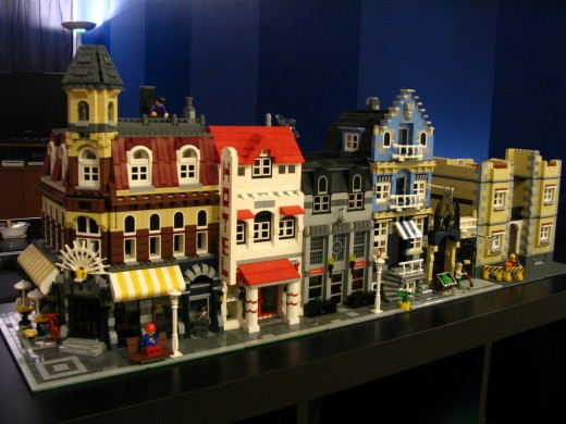 A collector's personal LEGO avenue, with a Cafe Corner on the far left, connected to houses of his own design.
